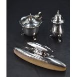 A George V silver two-piece condiment set, comprising pepperette and mustard, marks for London 1928,