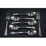 A group of four late Victorian silver Old English pattern teaspoons engraved with initials J&AD,