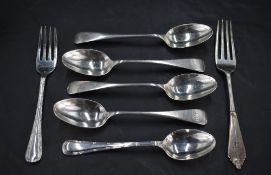 A group of four late Victorian silver Old English pattern teaspoons engraved with initials J&AD,