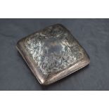 A George V silver cigarette case, of hinged rectangular form and curved for the gentleman's