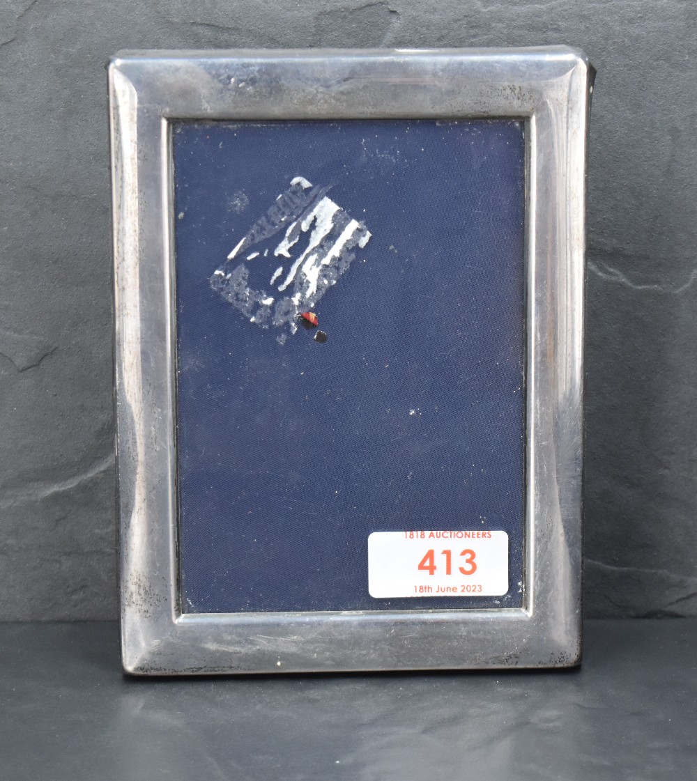 A Queen Elizabeth II silver photograph frame, of rectangular form with marks for Sheffield 1988, - Image 2 of 3