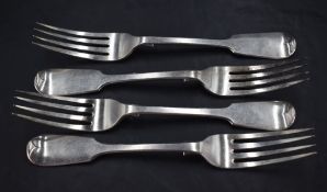 A group of four Victorian silver fiddle pattern forks, engraved stags head crest to reverse, marks