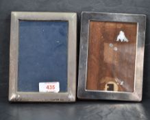 A Queen Elizabeth II silver photograph frame, of plain rectangular form, marks for Sheffield 1992,