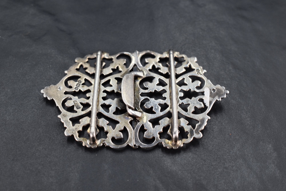 An Edwardian silver nurses belt buckle, of traditional design with engraved detail, marks for - Image 2 of 2