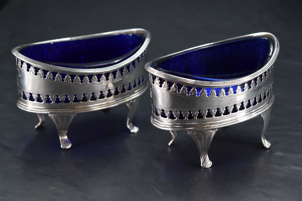 A pair of Scottish George III silver salts, of elliptical form with reeded rims over repeating