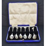 A group of eight Mexican 925 grade white metal coffee spoons, the stems marked 'mexico' and