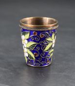 A 20th century Soviet era Russian gilt 925 grade white metal and enamel vodka cup, of tapering