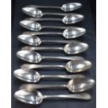 A set of twelve George V silver table spoons, Old English pattern pointed variant, engraved with