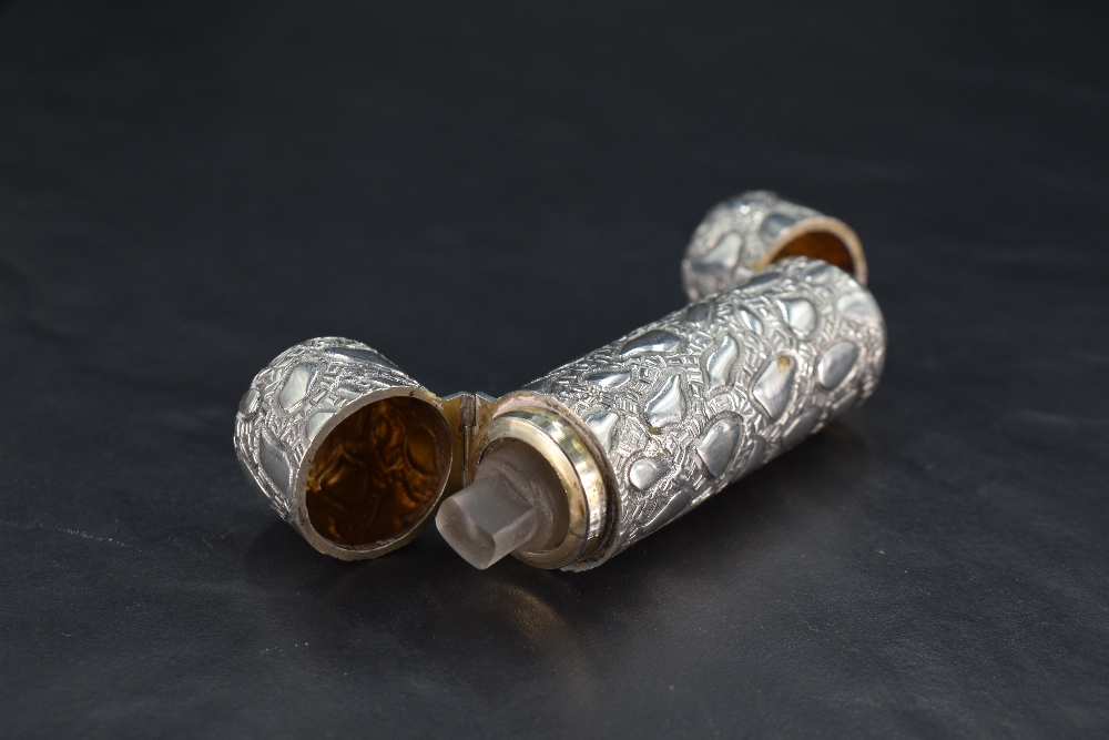 A Victorian silver double-ended scent bottle, of cylindrical form with embossed stylised decoration, - Image 3 of 3