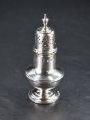 A George V silver pepperette, of traditional urn-form dredger design, marks for London 1934, maker C