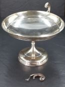 A George V silver two-handled tazza, of dished circular form with scrolled handles, knopped