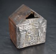 An Edwardian silver fronted money bank, formed as a building with embossed detail to front, marks