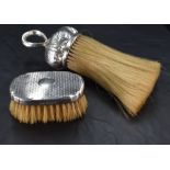 A Victorian silver mounted crumb brush with loop handle and planished surface, marks for