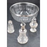 A George V silver rimmed cut-glass bowl, the plain rim over a fluted body and star-cut base, 19.