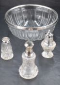 A George V silver rimmed cut-glass bowl, the plain rim over a fluted body and star-cut base, 19.