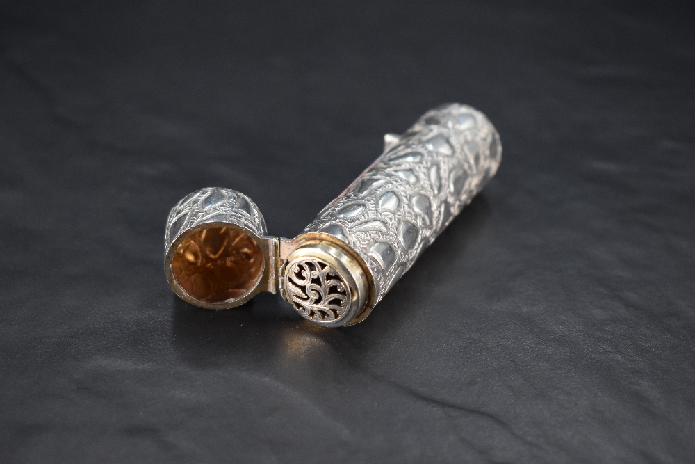 A Victorian silver double-ended scent bottle, of cylindrical form with embossed stylised decoration, - Image 2 of 3