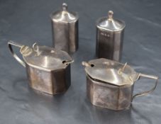 Two pairs of 1930's silver condiments, comprising two pepperettes and two salts, of canted square