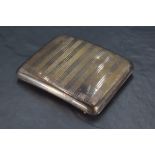 A George VI silver cigarette case, of hinged rectangular form and curved for the gentleman's pocket,