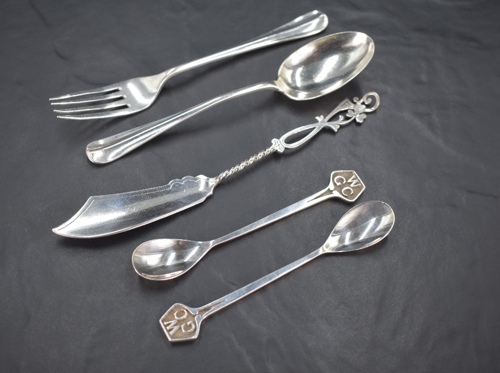 A pair of silver preserve spoons with shaped terminals initialled possibly for Windermere Golf Club,