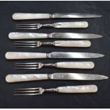 A group of George V Mother-of-Pearl handled silver dessert cutlery, comprising four three tined