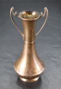 An Edwardian silver two-handled vase, of flared cylindrical form with slender shaped handles,