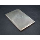 A George VI silver military interest cigarette case, of hinged rectangular form, engine-turned