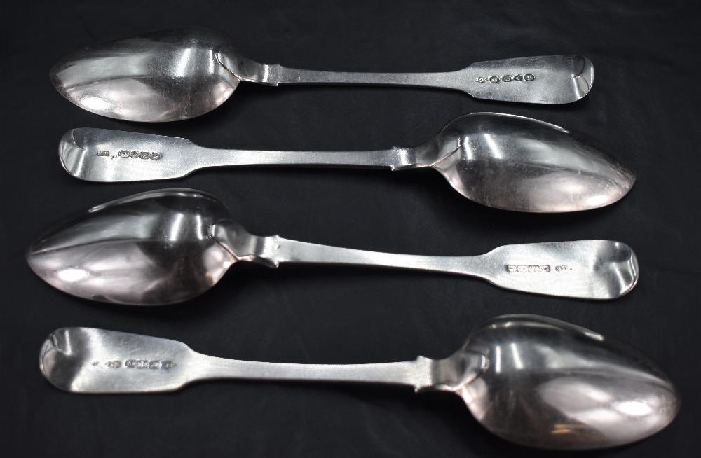 A group of four 19th century silver fiddle pattern table spoons, engraved stags head crest to - Image 2 of 2