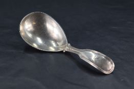 A Victorian silver caddy spoon, fiddle and thread pattern with engraved Masonic type crest, marks