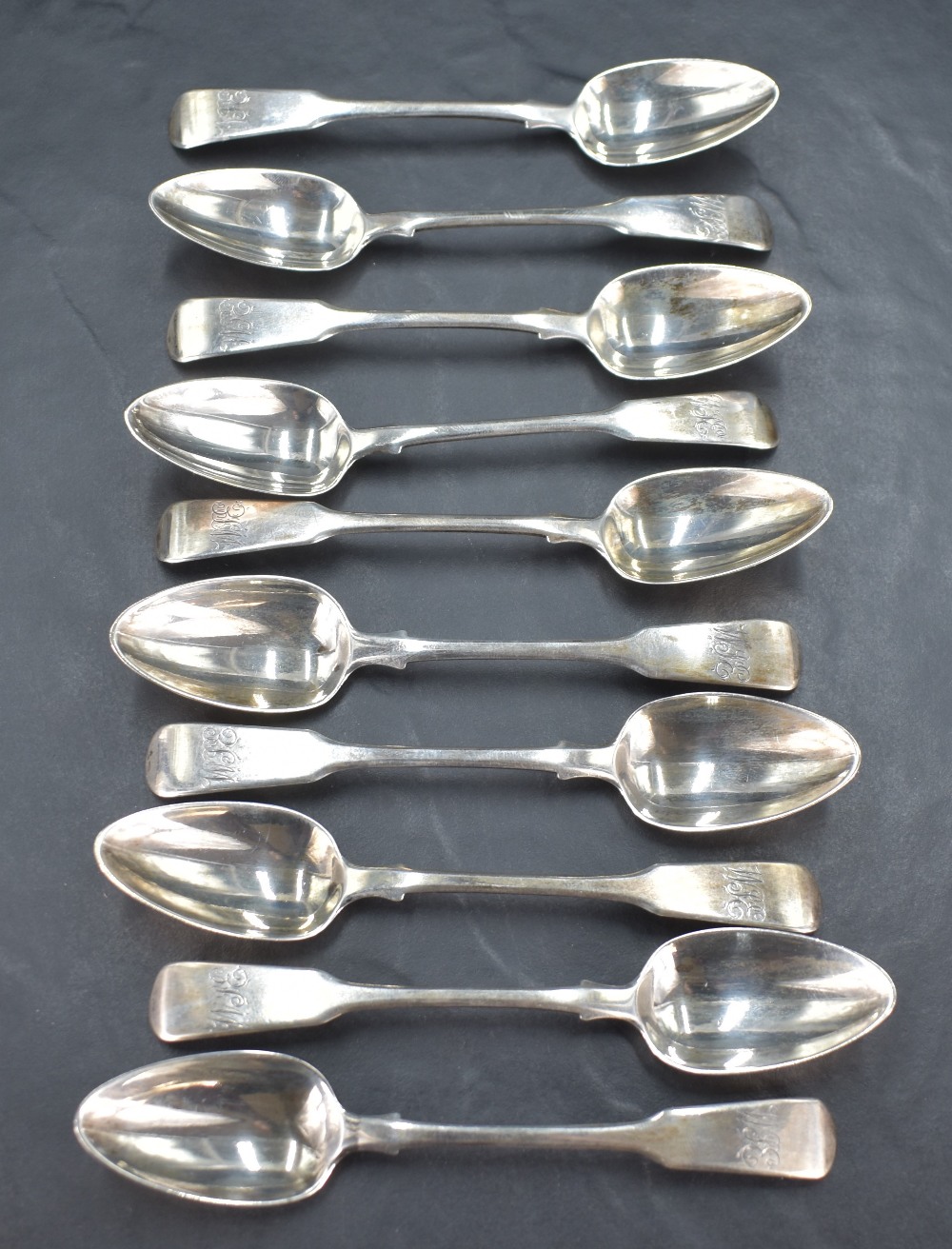 A set of ten George IV silver spoons, fiddle pattern with engraved initials WPE, marks for London