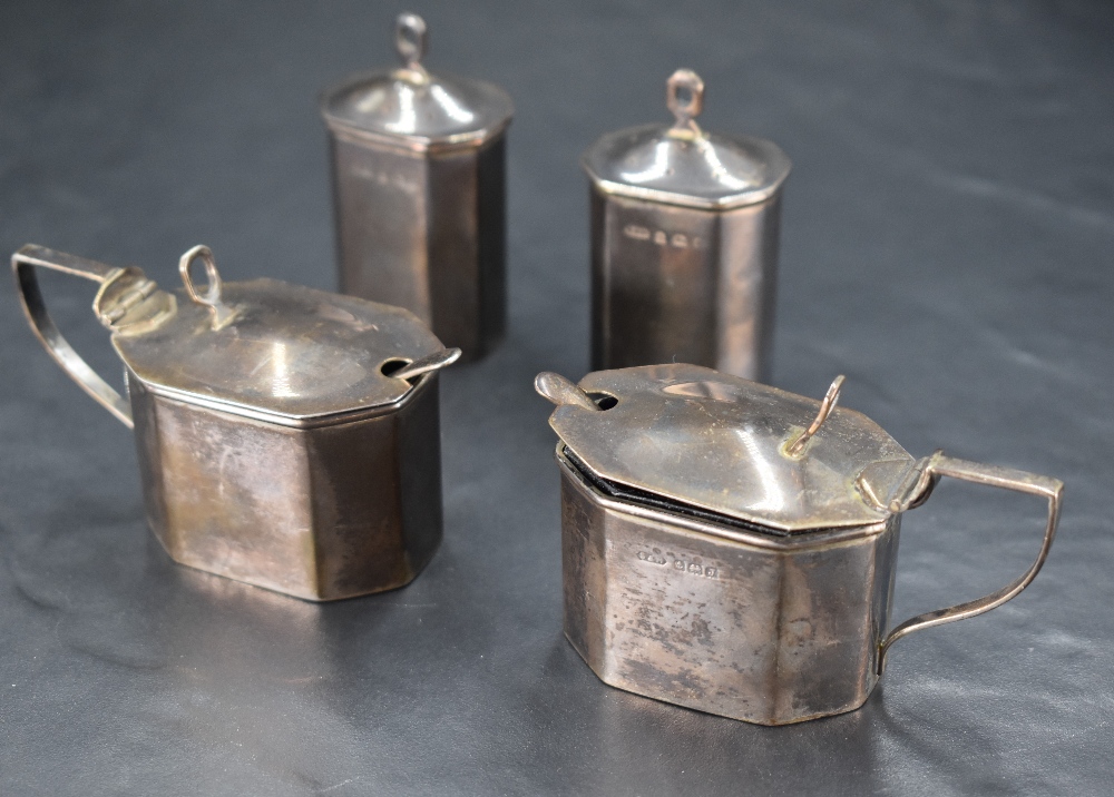 Two pairs of 1930's silver condiments, comprising two pepperettes and two salts, of canted square - Image 2 of 2