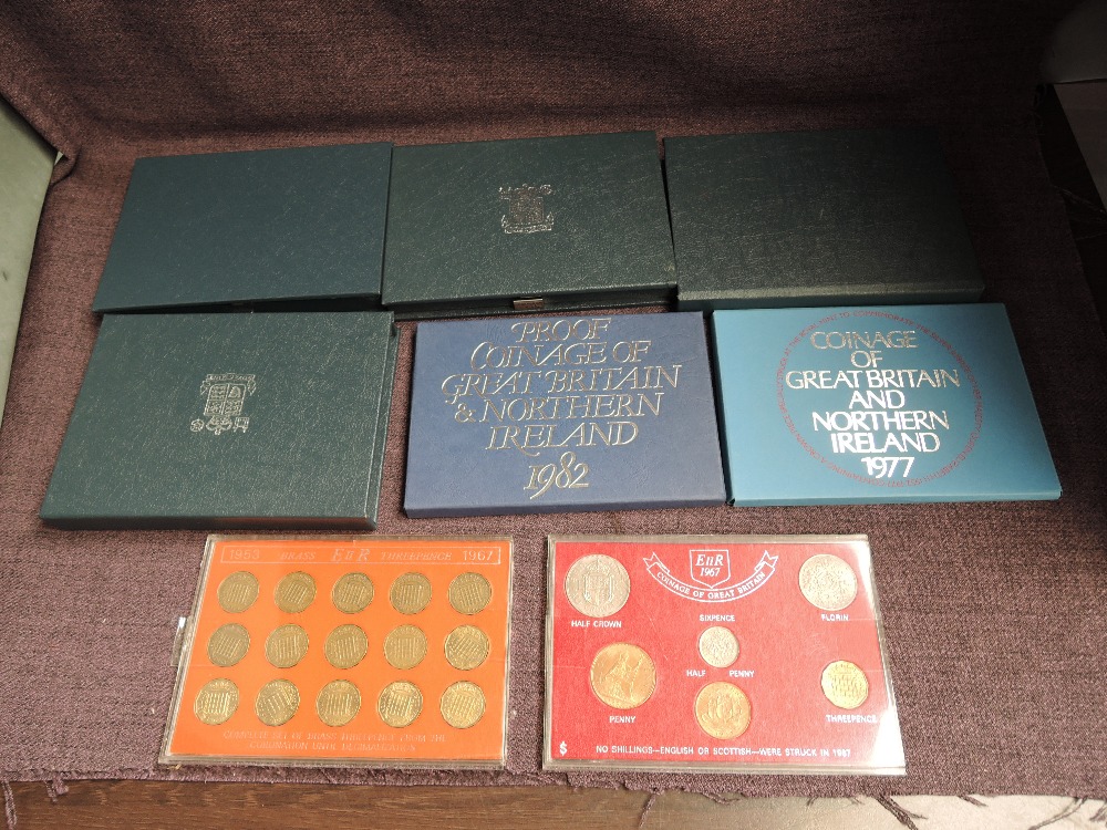 Six Royal Mint Coin Sets, GB & Northern Ireland 1977 and Proof 1982, GB 1983, 1984, 1985 and 1986