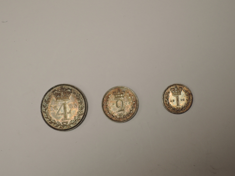 A part set of 1883 Queen Victoria Silver Maundy Coins, Four Pence, Two Pence and Penny