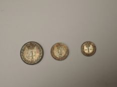 A part set of 1883 Queen Victoria Silver Maundy Coins, Four Pence, Two Pence and Penny
