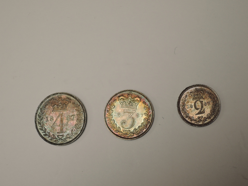 A part set of 1887 Queen Victoria Silver Maundy Coins, Four Pence, Threepence and Two Pence