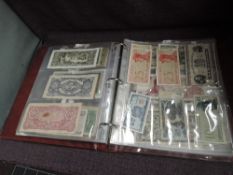 An album of GB and World Banknotes in album, 100+ notes including German 10,000 Marks x4 K3924295 to