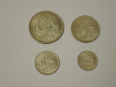 A set of four 1910 Edward VII Australian Silver Coins, Florin, Shilling, Sixpence and Threepence, in