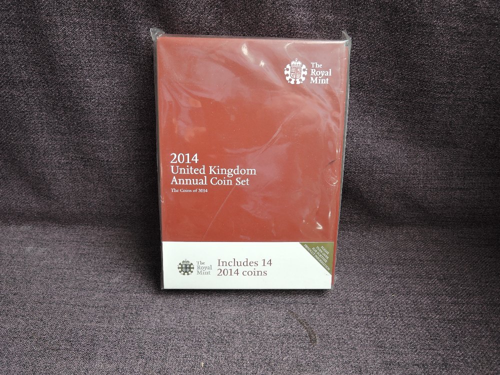 A Royal Mint 2014 United Kingdom Annual Coin Set, 14 Coins in original folder and sealed wallet