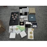 A box of Coin Sets including Princess Diana £5, 1987 GB Proof, Australia 1988 Proof, Canada 1980 Do