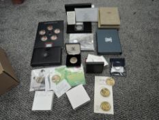 A box of Coin Sets including Princess Diana £5, 1987 GB Proof, Australia 1988 Proof, Canada 1980 Do