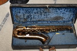A Buescher (elkhart) Tenor saxophone, Aristocrat model, stamped true tone low pitch, serial number