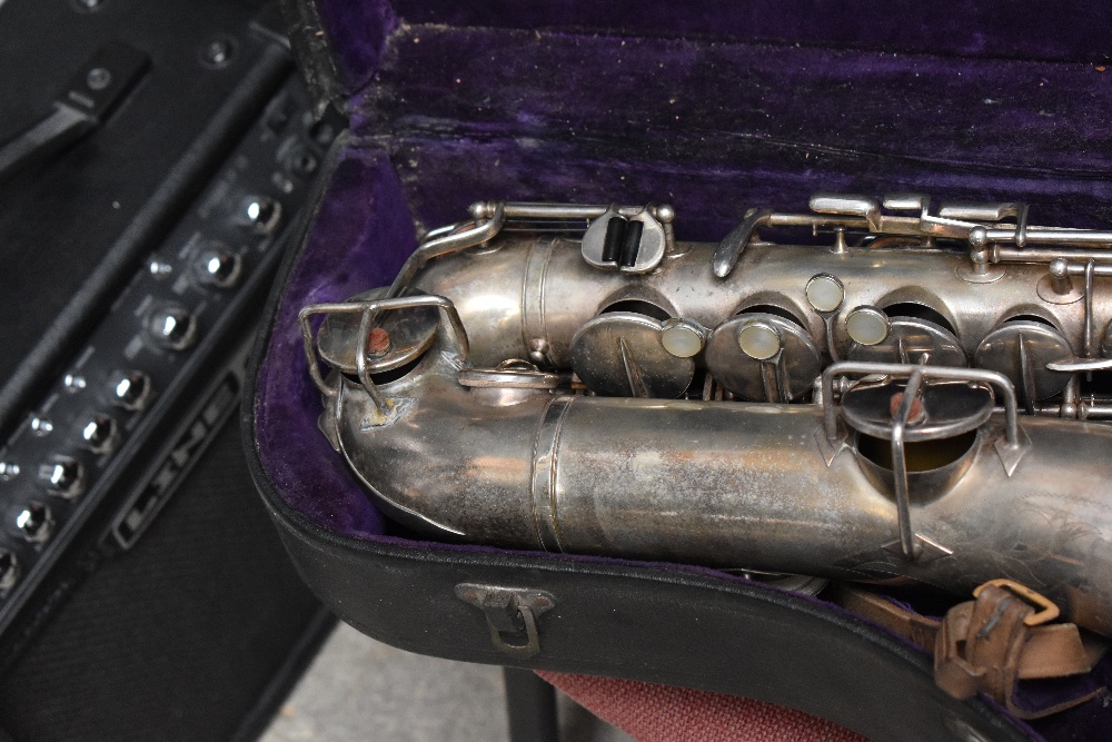 A vintage alto saxophone , stamped Buescher, Elkhart , low pitch true tone and serial number 102664 - Image 2 of 3