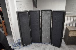 A set of four vintage column speakers, labelled KF