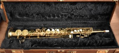 An Artemis soprano saxophone with plush lined case and two mouthpieces , serial number 939007