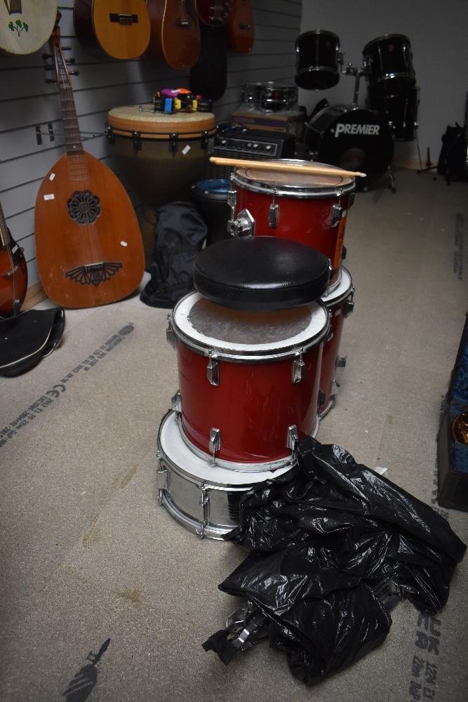 A four piece shell pack drum kit (no kick) with some stands etc, Pearl & Remo skins to the toms