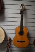A vintage Kasuga G-130 classical guitar, with hard case