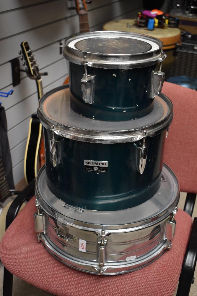 Two Olympic tom style (32 and 22cm diameter) and an unbranded snare drum