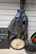 A Windsor Eclipse model 10 banjo (5 string but only 4 currently present) in denim style case