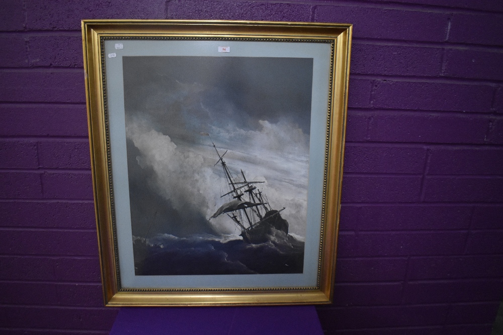 A 20th Century coloured print, a lone masted ship rocking in a choppy seascape, framed, mounted, and - Image 2 of 2