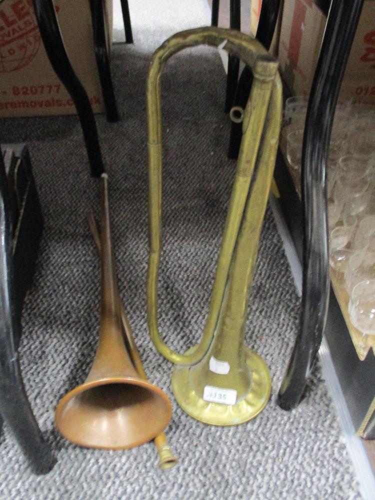 Two vintage horns, one brass the other a copper coaching horn with brass cuff, AF.