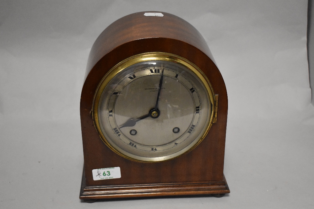 A 1930s Shierwater and Lloyd, Liverpool, mahogany domed mantel clock, having Roman numerals to